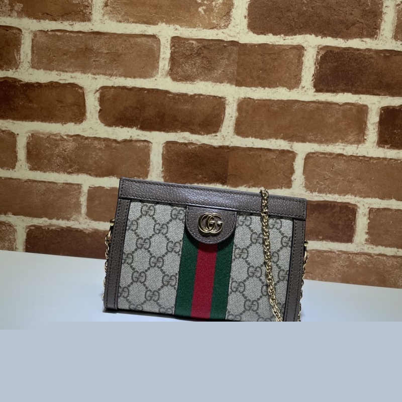 G*u*i clutch bags